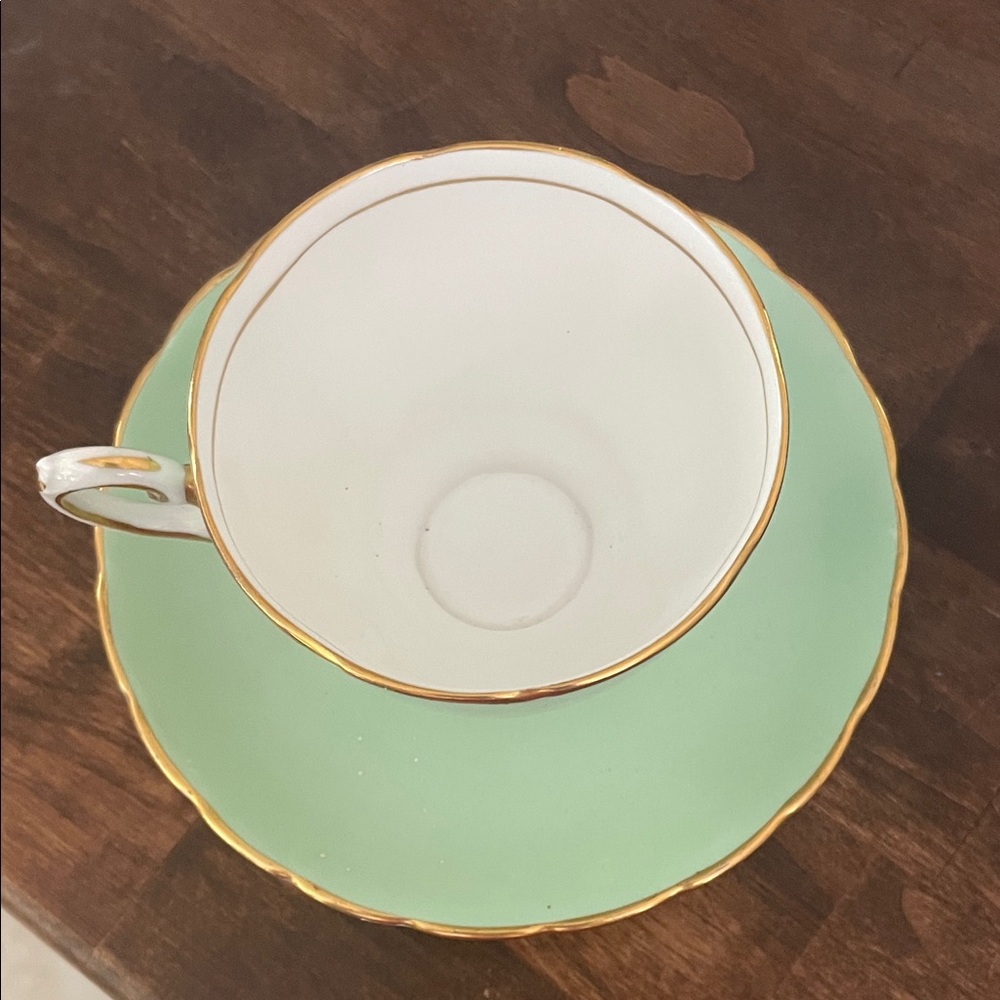 Elegant Gold-Trimmed Teacup and Saucer Set